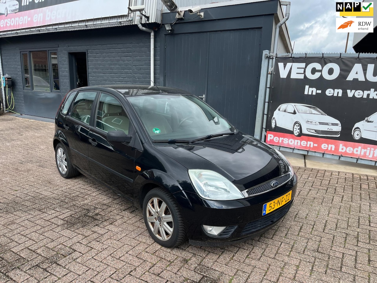 Ford Fiesta - 1.4-16V Ghia automaat * START SOMS NIET AAN * airco - AutoWereld.nl
