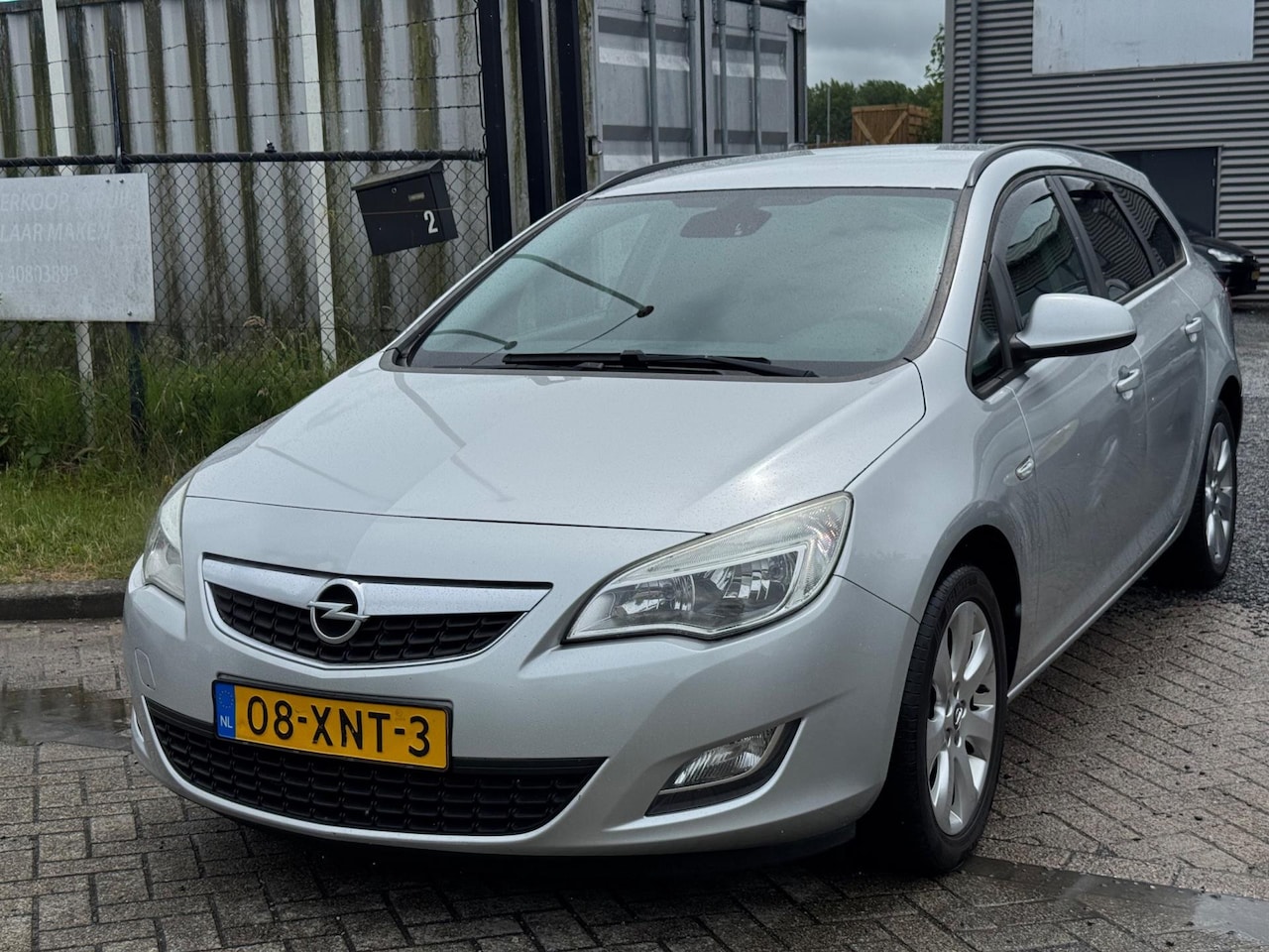 Opel Astra Sports Tourer - 1.4 Cosmo Navi Clima Elektrische Ramen - AutoWereld.nl