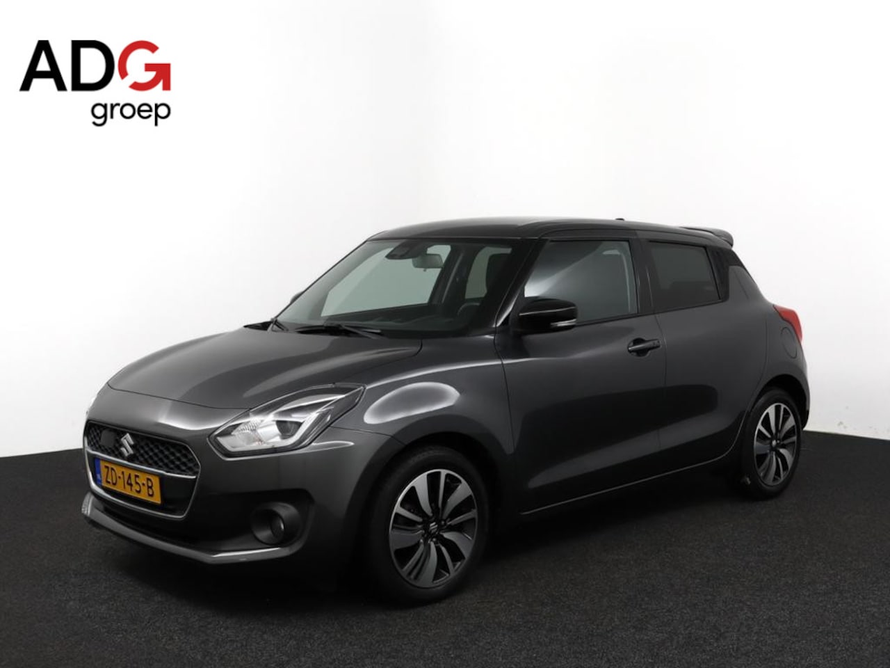 Suzuki Swift - 1.2 Stijl Smart Hybrid | Climate control | Cruise control adaptive | Navigatie | Spoiler | - AutoWereld.nl