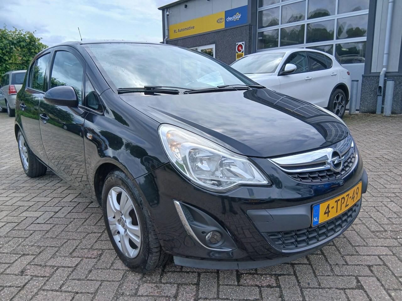 Opel Corsa - 1.2-16V Anniversary Edition - 5 Drs - Airco - Trekhaak - AutoWereld.nl