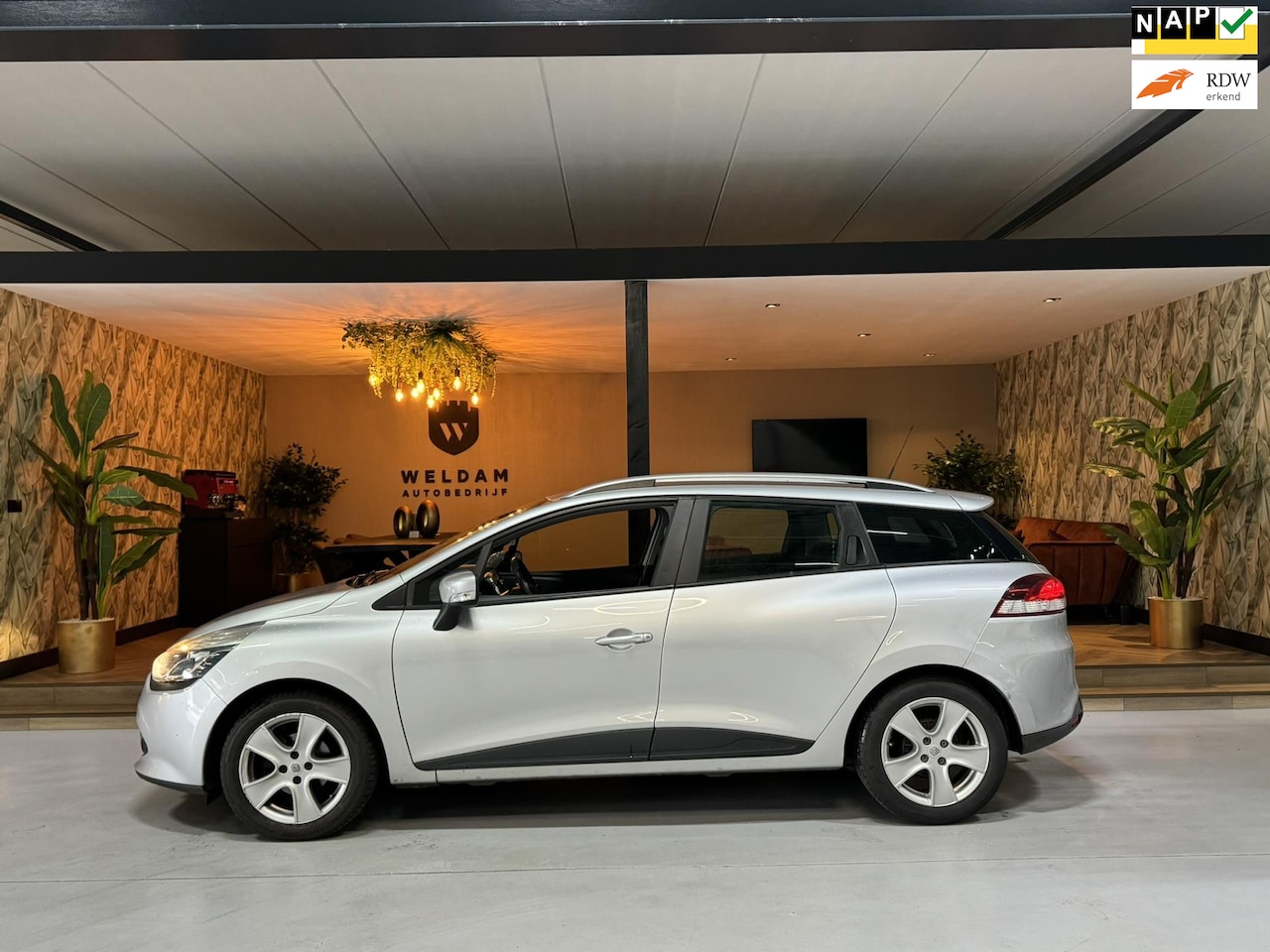 Renault Clio Estate - 0.9 TCe Dynamique Trekhaak Navi Cruise Airco Bluetooth Rijklaar - AutoWereld.nl
