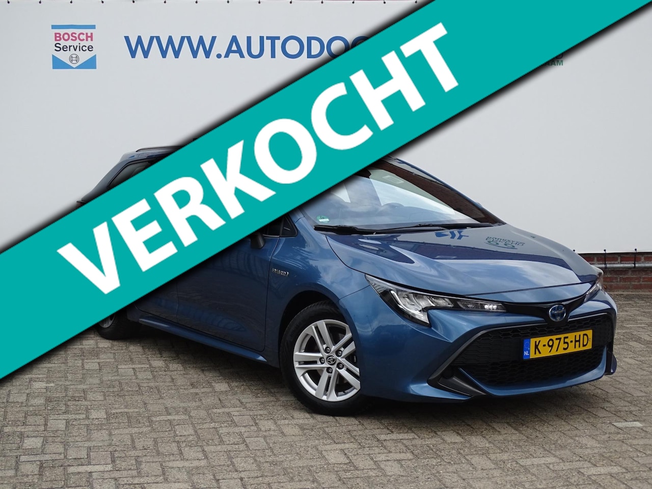 Toyota Corolla Touring Sports - 1.8 Hybrid Active|Camera|NAV|All Season - AutoWereld.nl