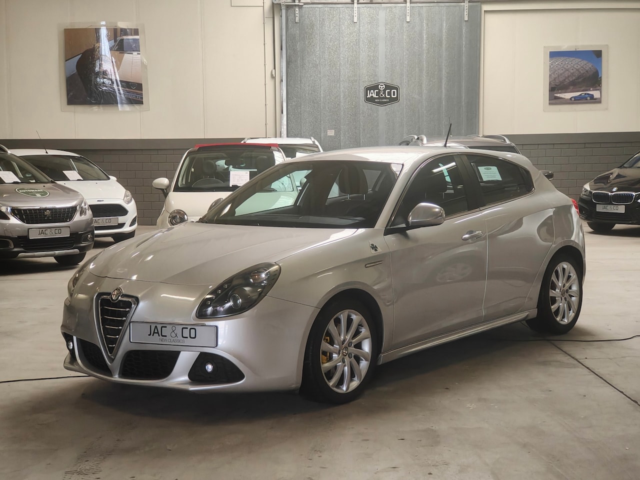 Alfa Romeo Giulietta - 1.4 T Progression Navigatie - Camera - Zwart leer - AutoWereld.nl