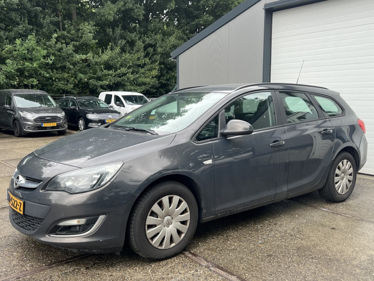 Opel Astra Sports Tourer - 1.7 CDTi Business + | Airco | PDC V+A - AutoWereld.nl