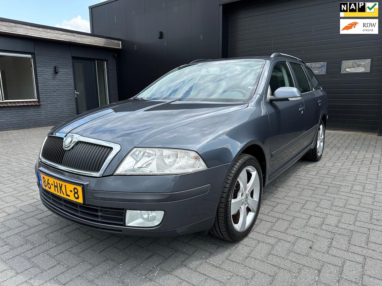 Skoda Octavia Combi - 1.6 FSI TOUR BJ09 AIRCO LMV - AutoWereld.nl