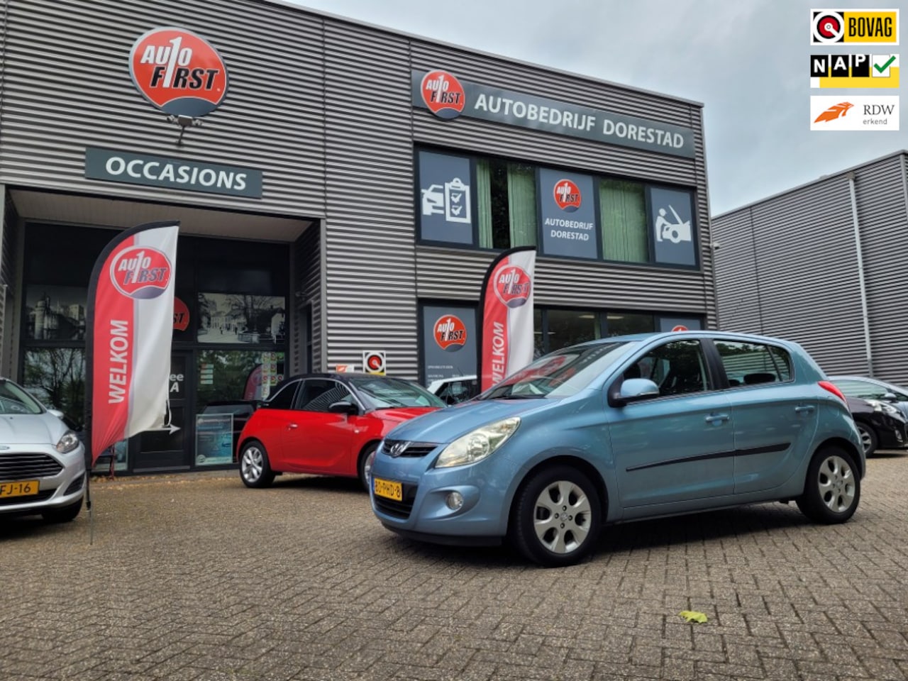 Hyundai i20 - 1.4i i-Catcher | climate control| parkeersensoren| half leer| elektrische ramen| full opti - AutoWereld.nl