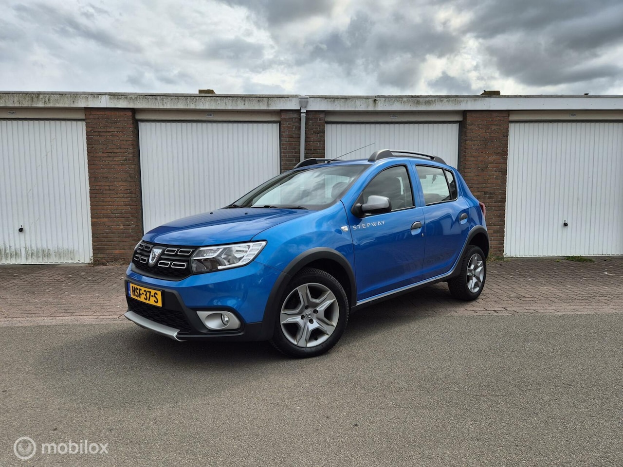 Dacia Sandero Stepway - 0.9 TCe SL / 1e Eigenaar / Airco / Cruisecontrol / Achteruitrijcamera - AutoWereld.nl