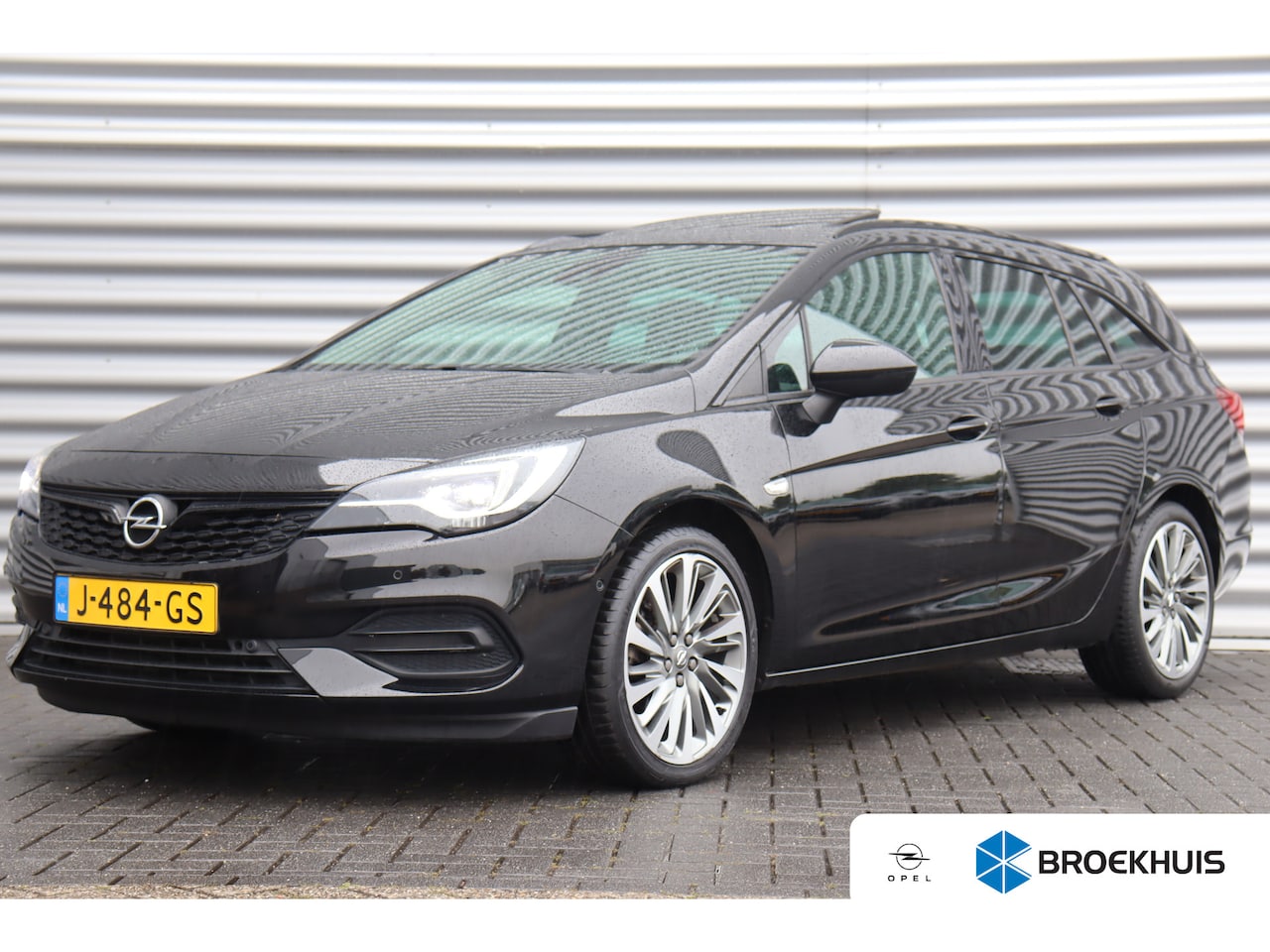 Opel Astra Sports Tourer - 1.2 TURBO 130PK ELEGANCE+ / NAVI / LEDER / CLIMA / FULL-LED / PDC / CAMERA / 18" BI-COLOR - AutoWereld.nl