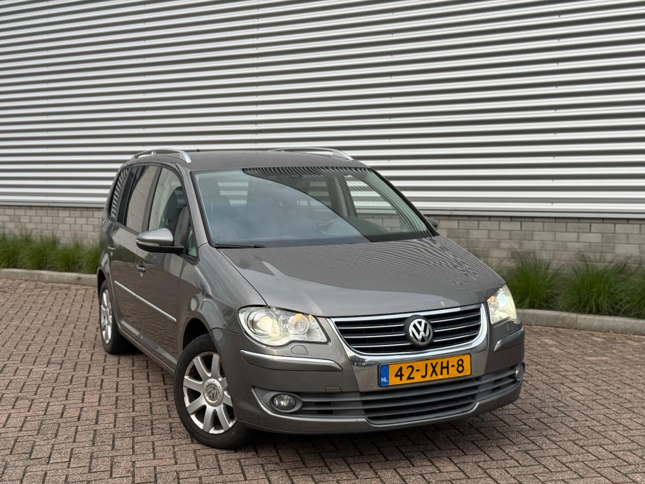 Volkswagen Touran - 1.4 TSI Highline (Bj 2009) automaat|xenon|navi| - AutoWereld.nl