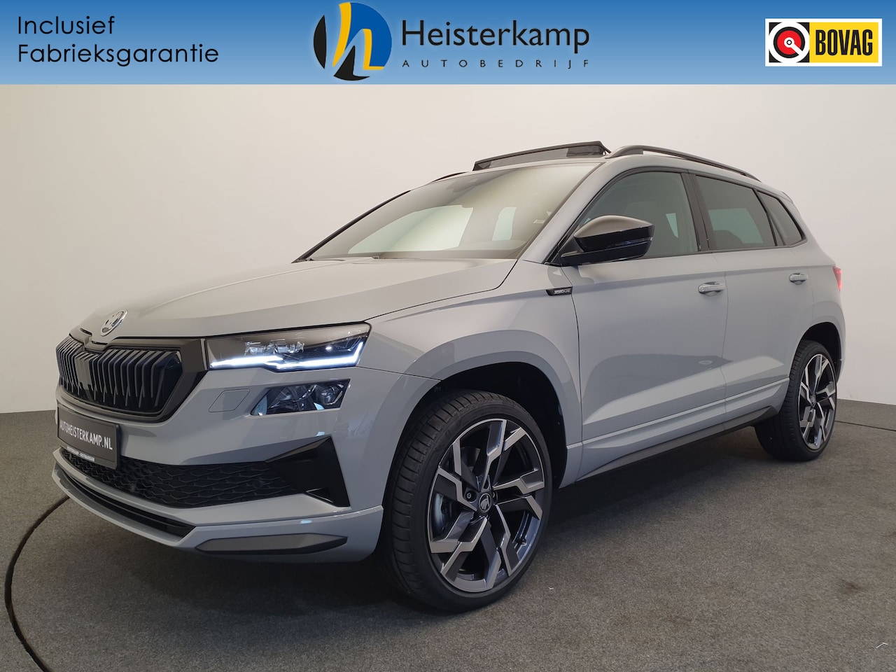 Skoda Karoq - 1.5 TSI 150pk DSG/AUT Sportline Wegklapbare trekhaak, Panoramadak, 19'' velgen - AutoWereld.nl