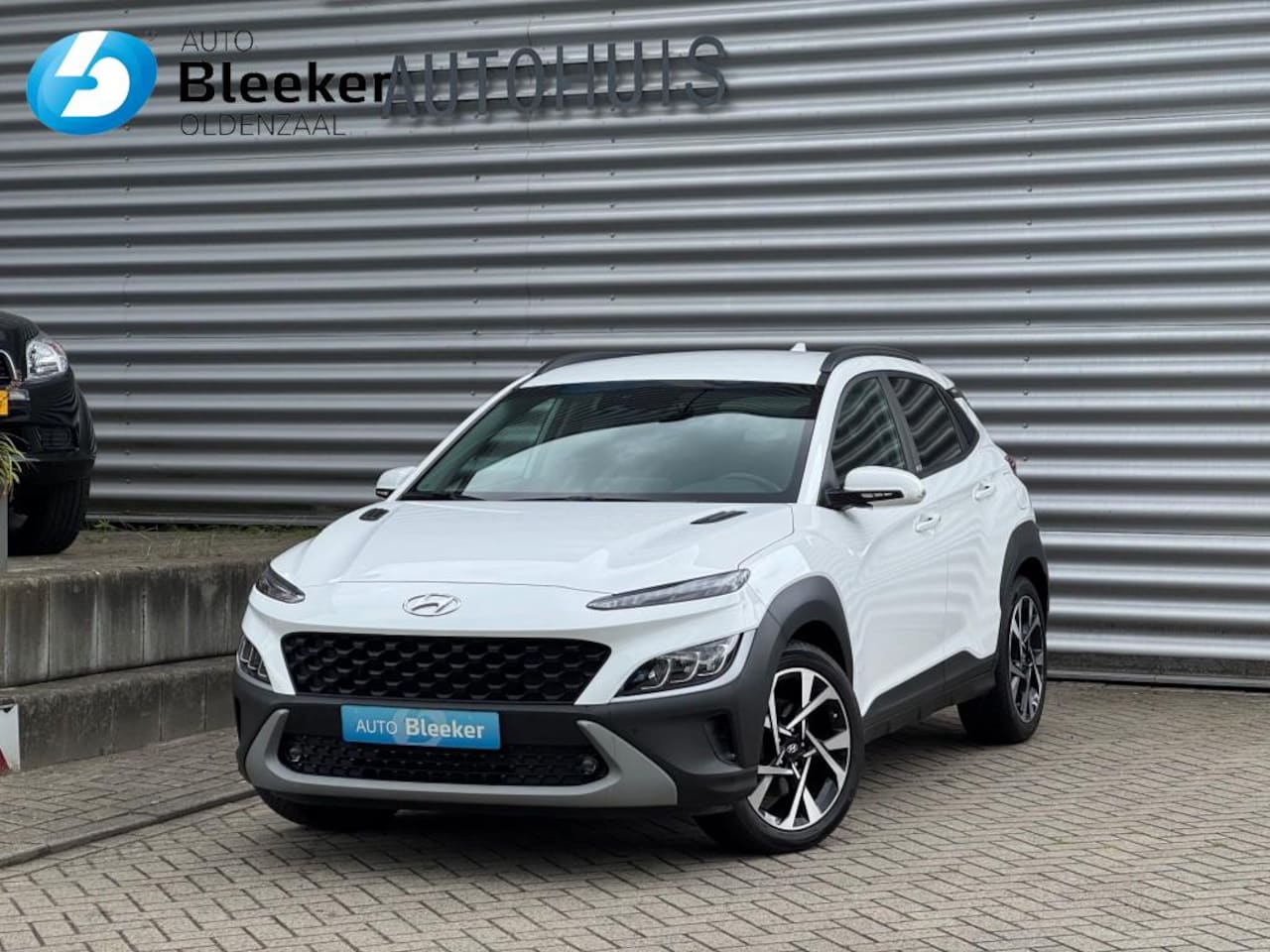 Hyundai Kona - 1.0 T-GDI Pure Airco Cruise Navi Camera Stoel/stuur verwarmin - AutoWereld.nl