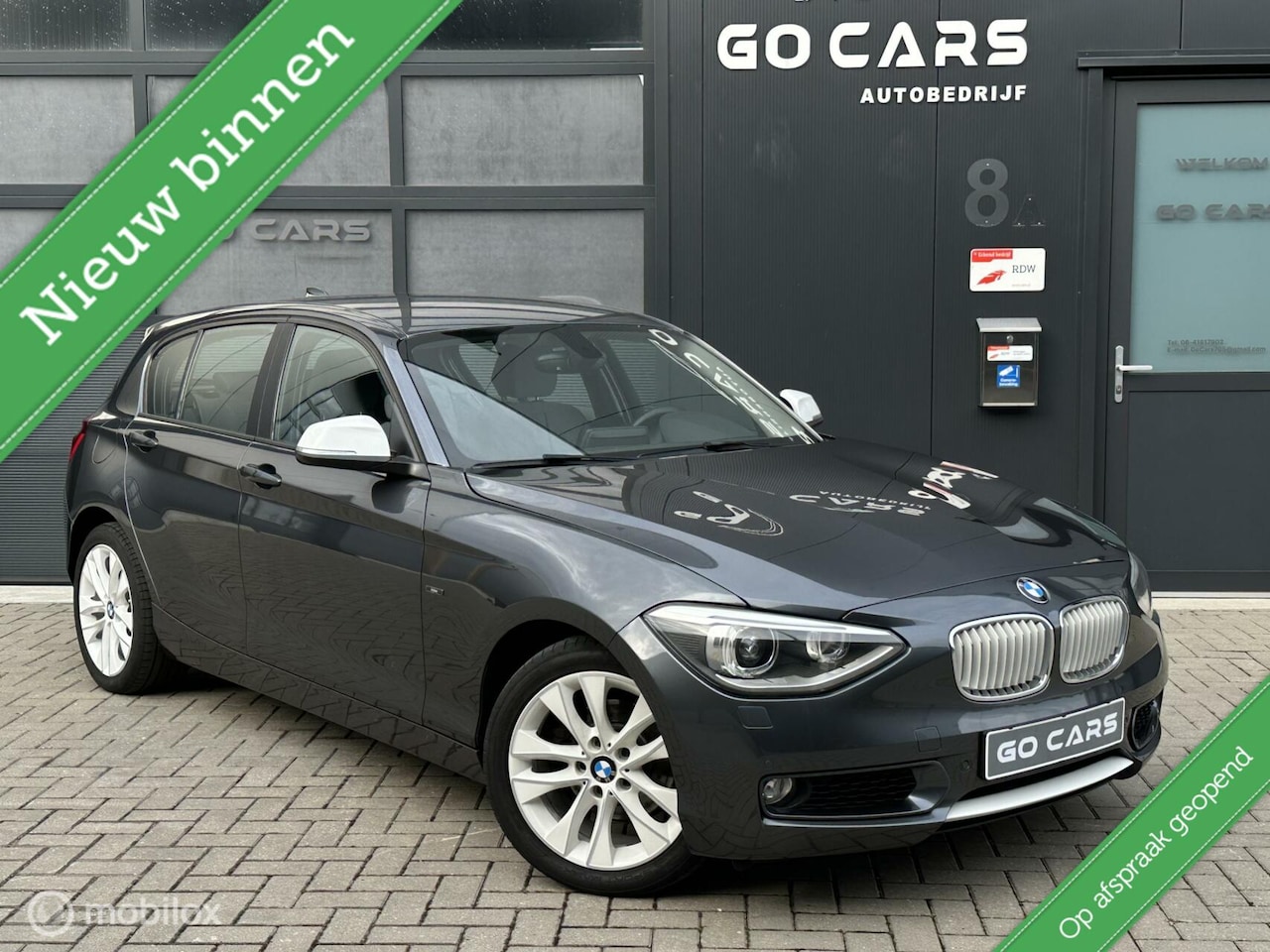 BMW 1-serie - 118i Urban Line Navi - AutoWereld.nl