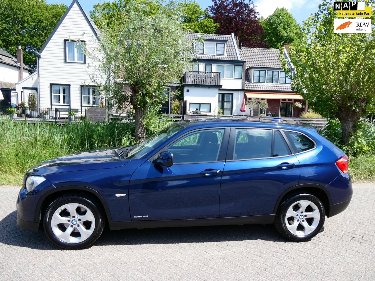 BMW X1 - SDrive18i Exe 150pk Automaat Clima Navi PDC Trekhaak Geen import - AutoWereld.nl