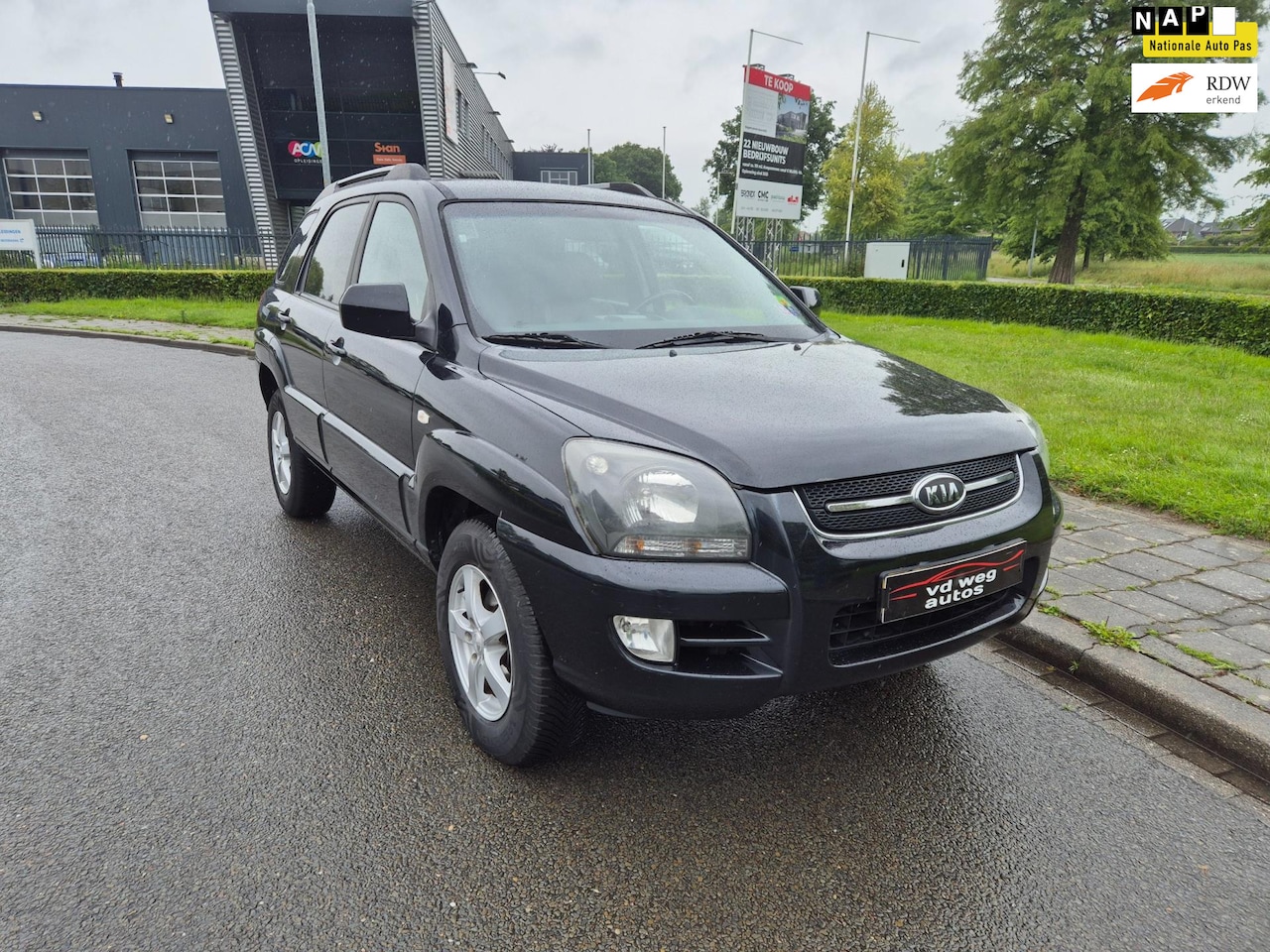 Kia Sportage - 2.0 CVVT X-ception airco leer - AutoWereld.nl