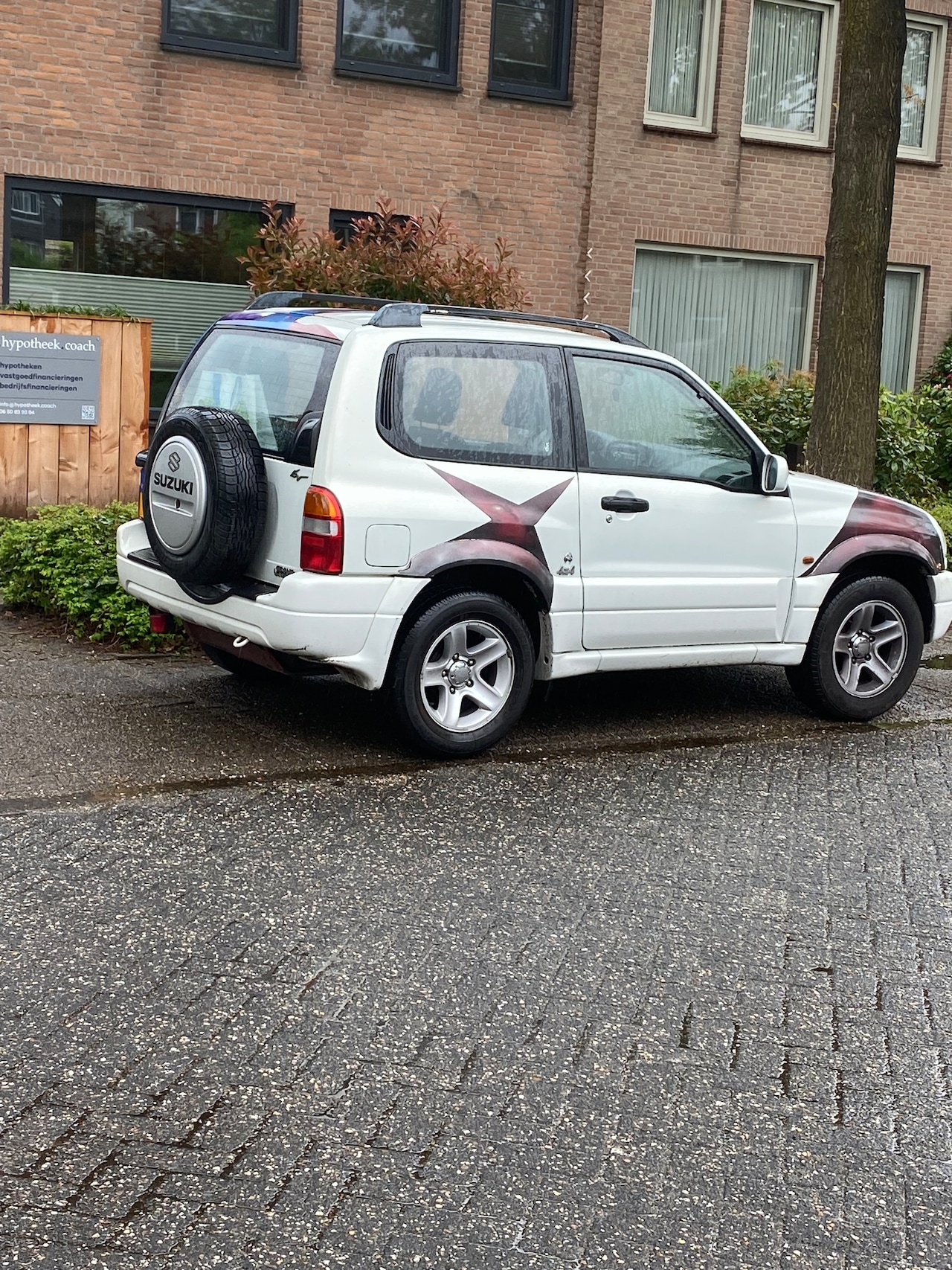 Suzuki Grand Vitara - 2.0 Metal Top Wide Body Automaat / Airco - AutoWereld.nl