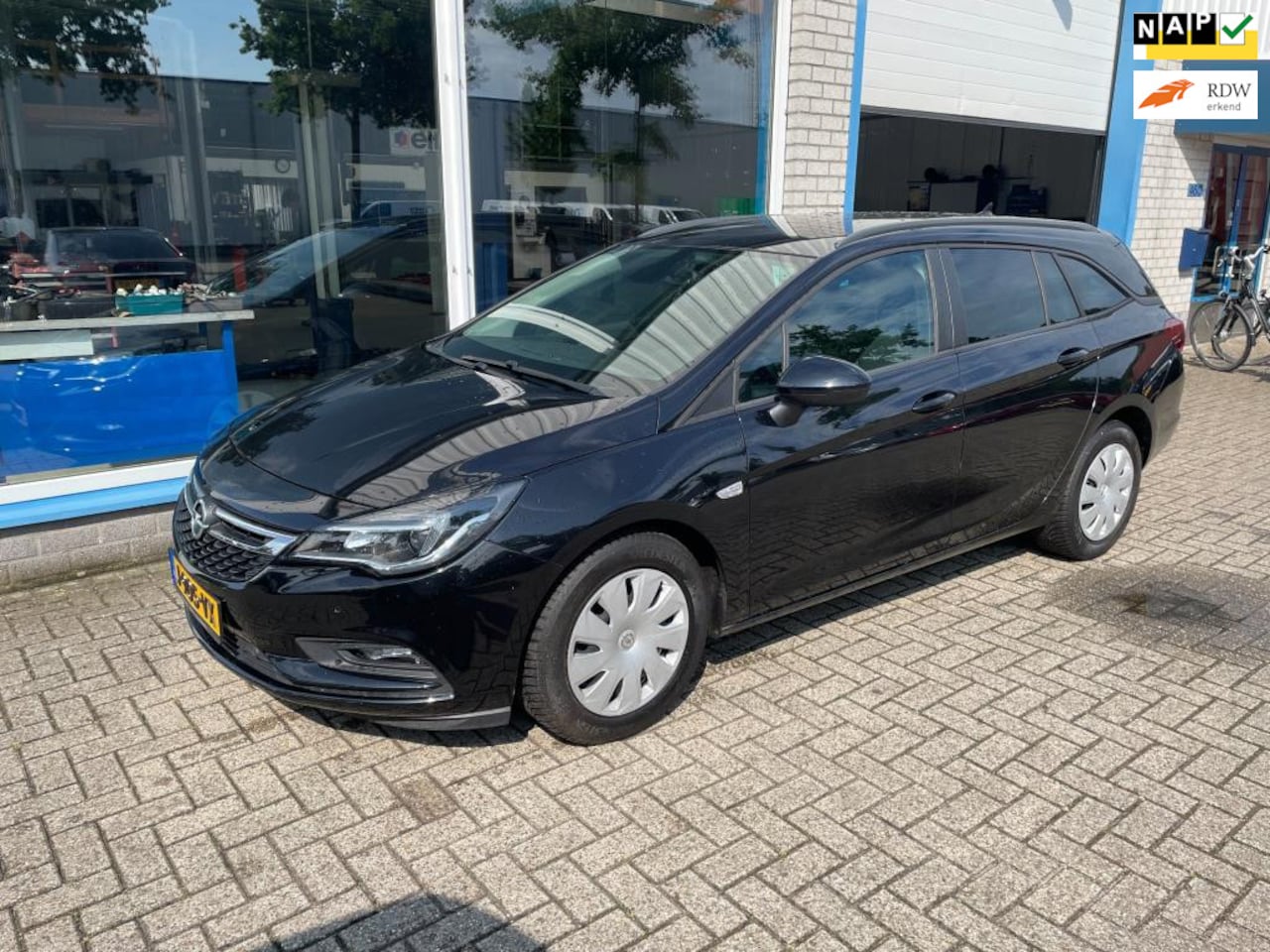 Opel Astra Sports Tourer - 1.0 Turbo 120 Jaar Edition 1.0 Turbo 120 Jaar Edition - AutoWereld.nl