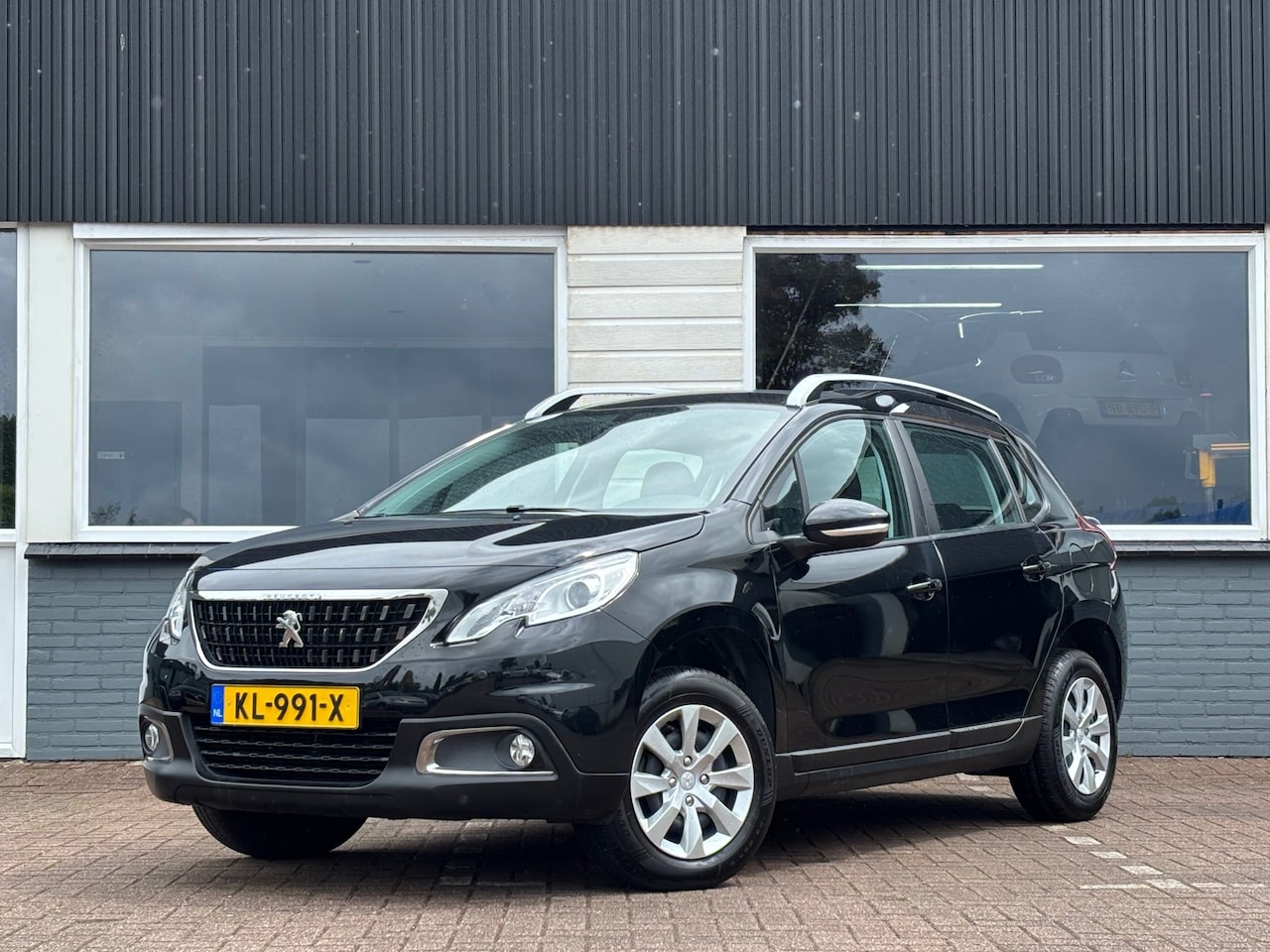 Peugeot 2008 - 1.2 PureTech Blue Lion / Navi / 2016 / APK - AutoWereld.nl