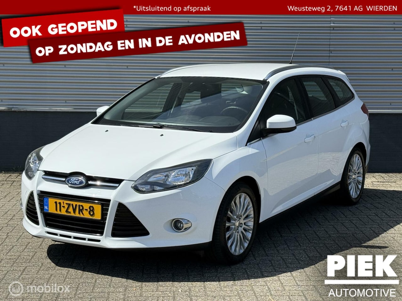 Ford Focus Wagon - 1.0 EcoBoost Titanium TREKHAAK - AutoWereld.nl
