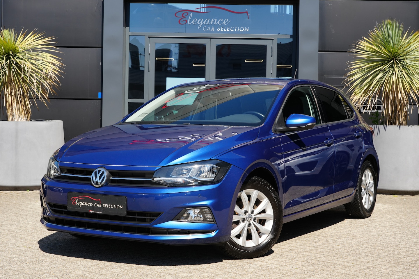 Volkswagen Polo - 1.0 TSI Highline 96pk Navigatie/Stoelverwarming/PDC - AutoWereld.nl