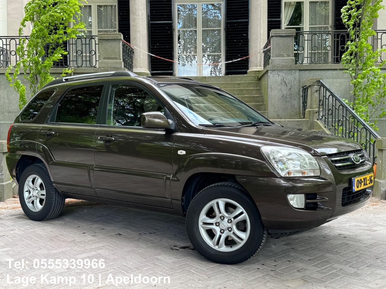 Kia Sportage - 2.0 CVVT Comfort Leder Climate Cruise Ctr Trekhaak Pdc Lmv - AutoWereld.nl
