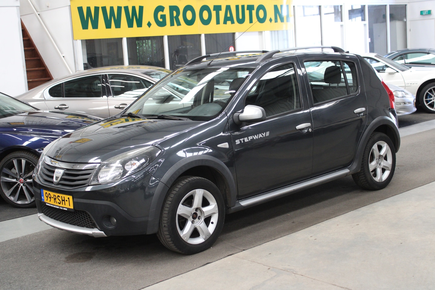 Dacia Sandero Stepway - 1.6 LPG NAP, Airco, Trekhaak, Stuurbekrachtiging - AutoWereld.nl