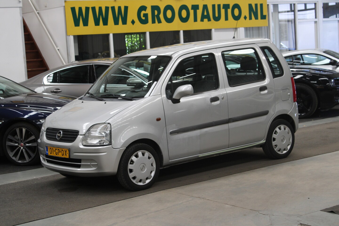 Opel Agila - 1.2-16V Comfort NAP, Airco, Stuurbekrachtiging - AutoWereld.nl