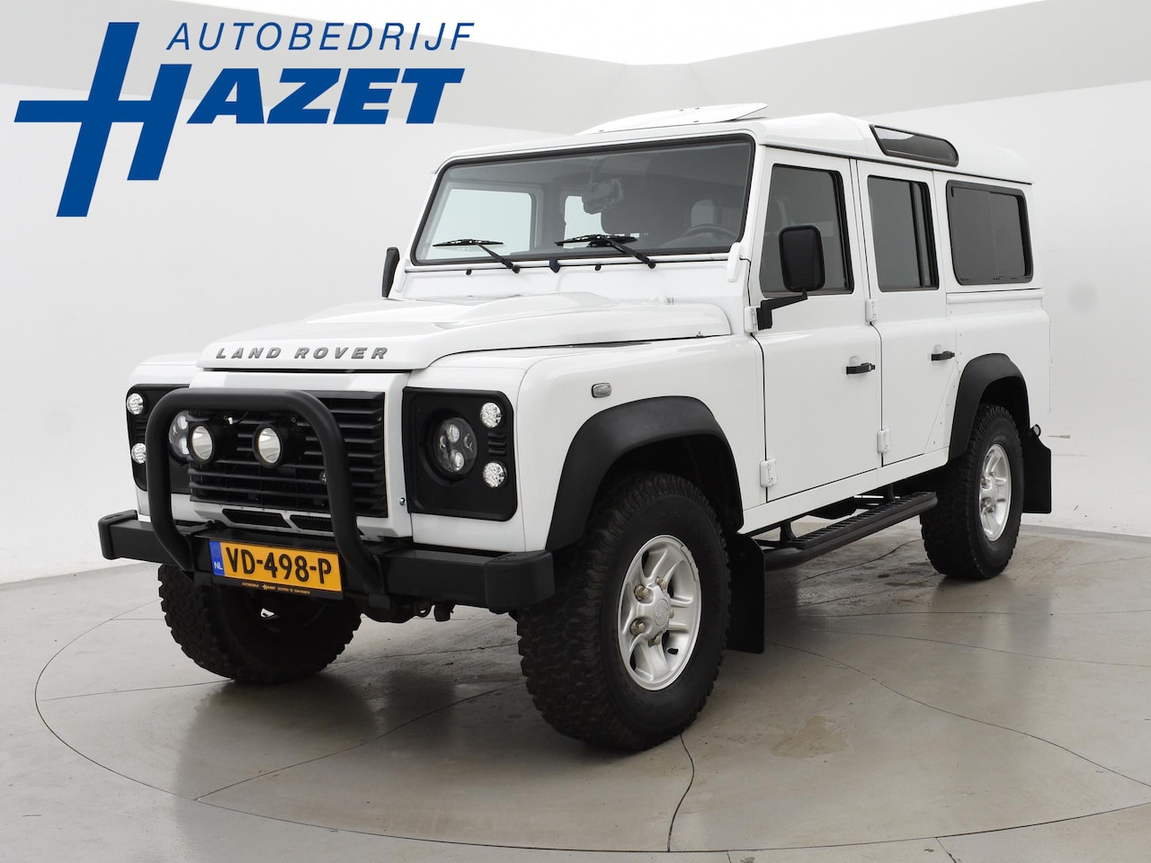 Land Rover Defender 110 - 2.2 D SW 110" *69.246 KM* GRIJS KENTEKEN + LED | STOELVERW. | KANTELDAK | AIRCO | TREKHAAK - AutoWereld.nl