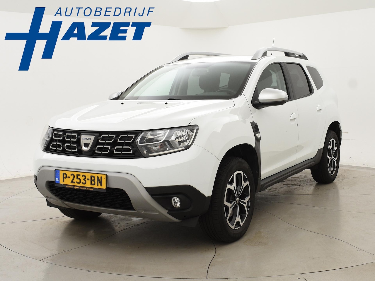 Dacia Duster - 1.3 TCe 150 PK PRESTIGE + 1500 KG TREKHAAK | STOELVERW. | CAMERA | APPLE CARPLAY | NAVIGAT - AutoWereld.nl