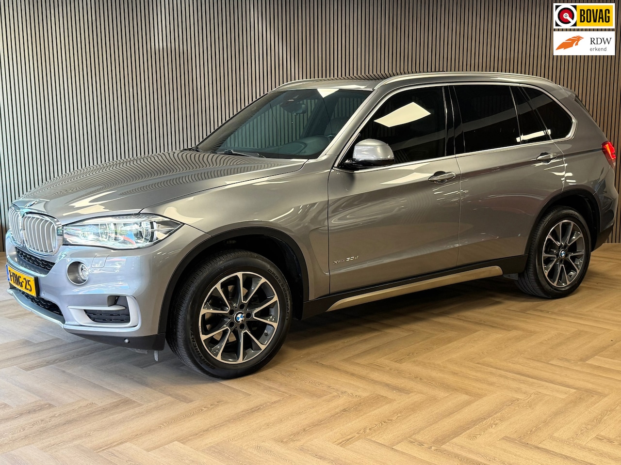 BMW X5 - XDrive30d High Executive 7persoons. AUT PANORAMADAK LEDER NAVIGATIE MEMORY CAMERA HEAD-UP - AutoWereld.nl