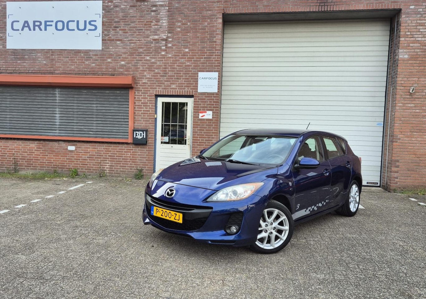 Mazda 3 - 1.6 Business PDC Trekhaak Cruise Airco 04-26 APK - AutoWereld.nl