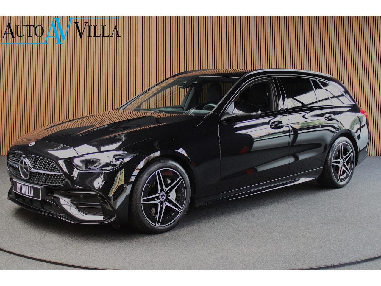 Mercedes-Benz C-klasse Estate - 180 AMG Line Navi Leer Camera Nightpack PTS Ambient Elekt. achterklep Trekhaak elektr. PTS - AutoWereld.nl