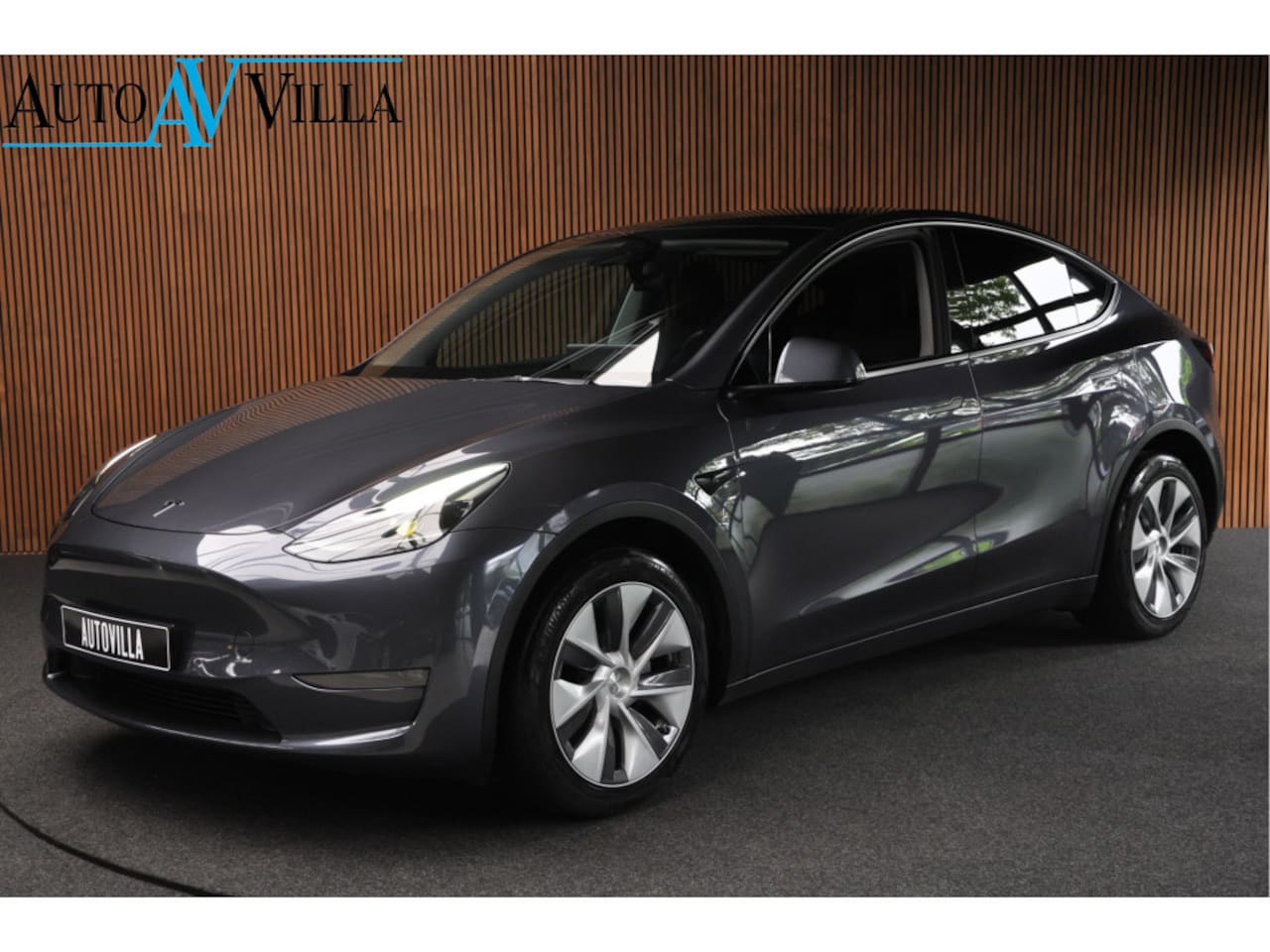 Tesla Model Y - Long Range Dual Motor AWD 514pk Afn. trekhaak Navi Camera Leer Warmtepomp ACC Autopilot PD - AutoWereld.nl
