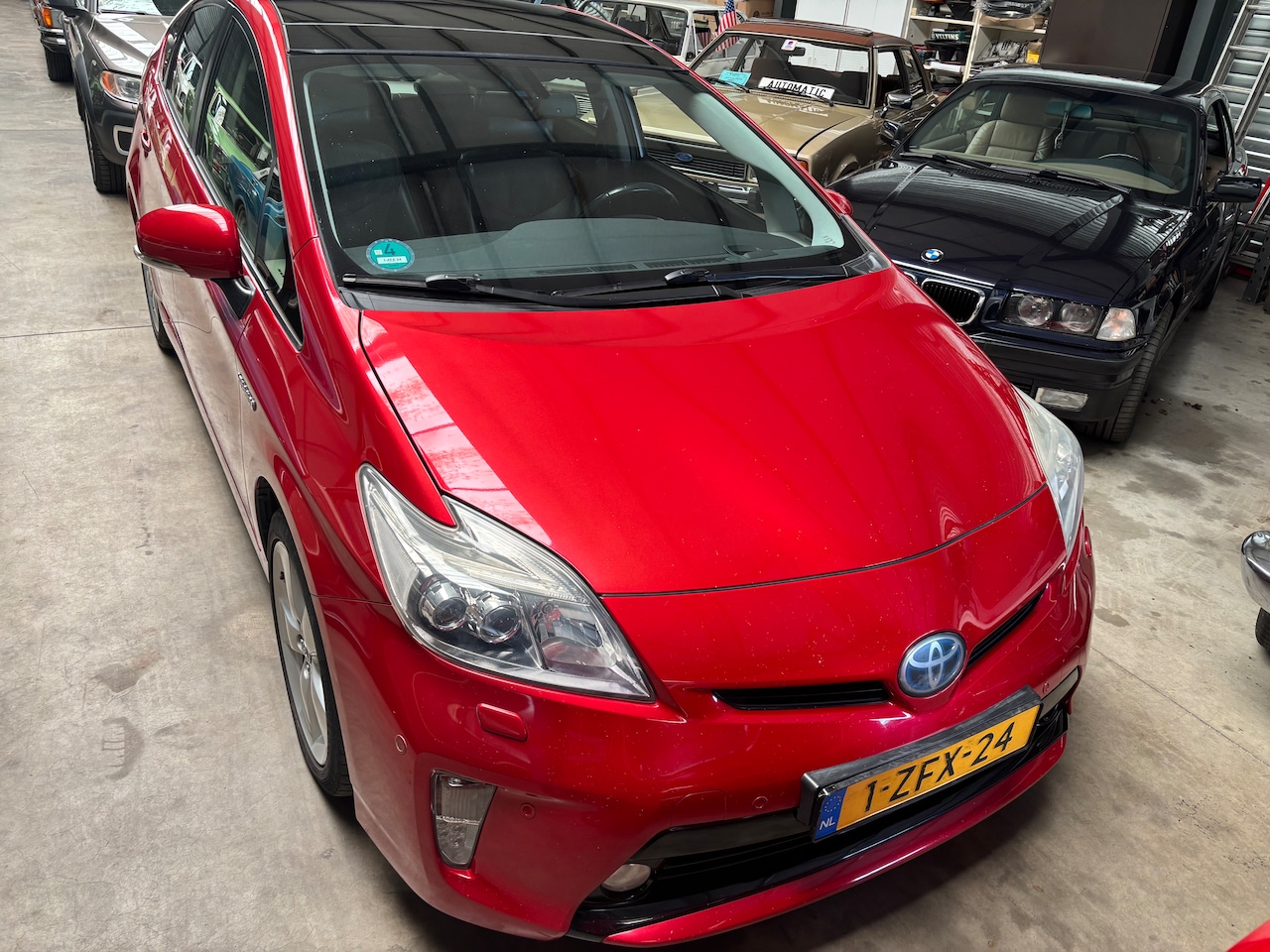 Toyota Prius - 1.8  Executive Business Leer, open dak, dak, adaptieve cruisecontrol - AutoWereld.nl