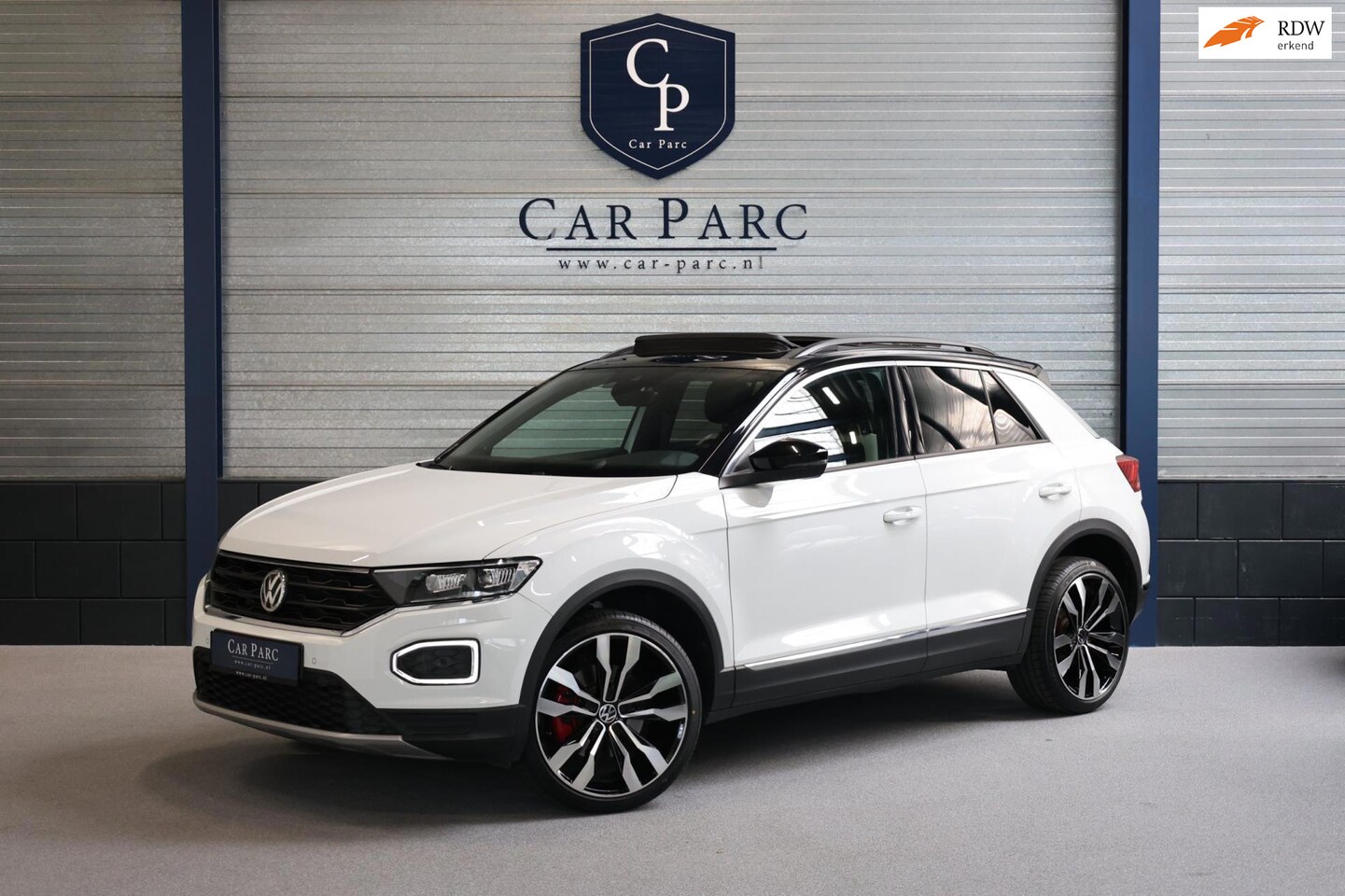 Volkswagen T-Roc - 2.0 TSI 4Motion R-LINE LED/VIRTUAL/SFEER/PANO/HALF LEDER+S.VERWARMING/19"LMV/PDC/LINE/ACC/ - AutoWereld.nl