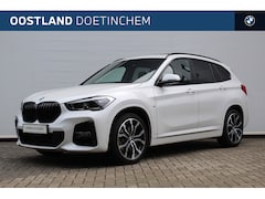 BMW X1 - sDrive20i High Executive M Sport Automaat / Panoramadak / Trekhaak / Sportstoelen / Achter