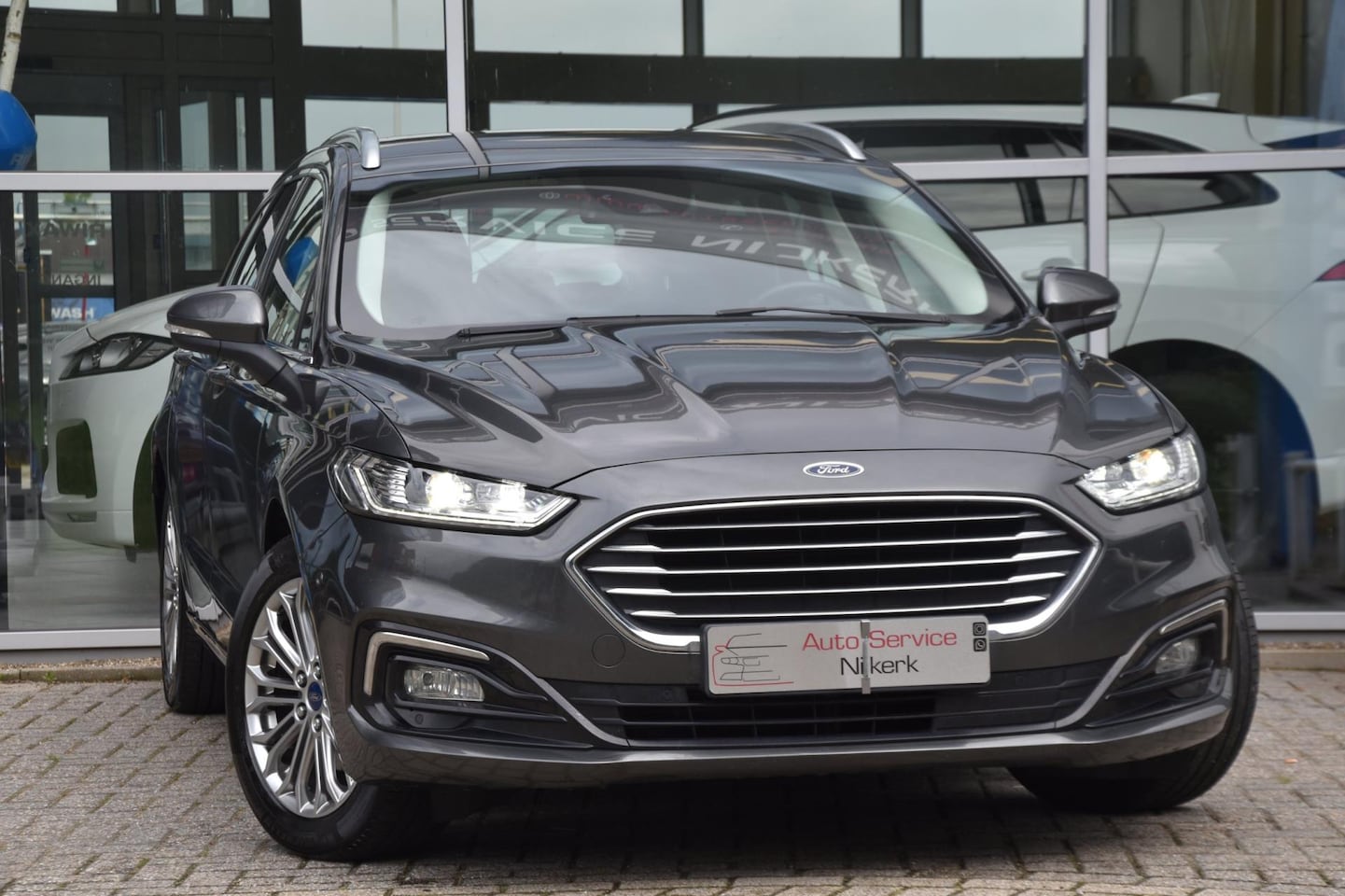 Ford Mondeo Wagon - 2.0 IVCT HEV Titanium Aut. Airco Navi. Btw 1e Eigenaar - AutoWereld.nl