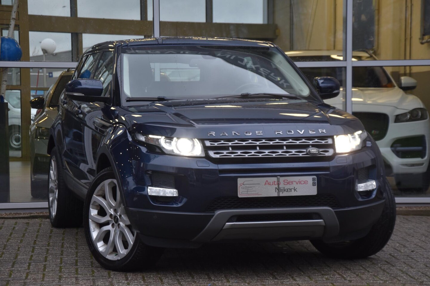 Land Rover Range Rover Evoque - 2.0 Si 4WD Pure Aut. Leder Airco Navi. Camera Pdc - AutoWereld.nl