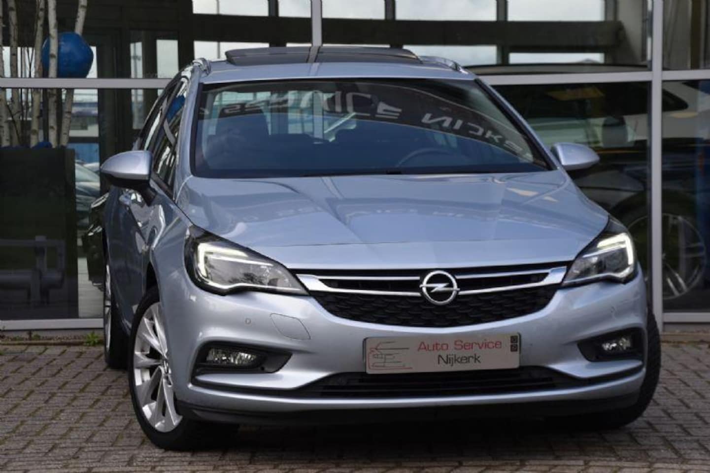 Opel Astra Sports Tourer - 1.0 Edition Airco Nav. Dak Led Pdc Trekhaak - AutoWereld.nl