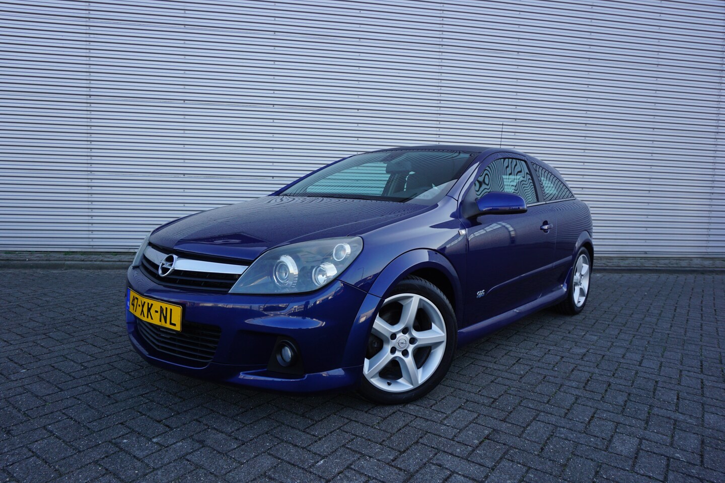 Opel Astra GTC - 1.6 Cosmo OPC-line / Xenon / Climate / Cruise / Trekhaak - AutoWereld.nl