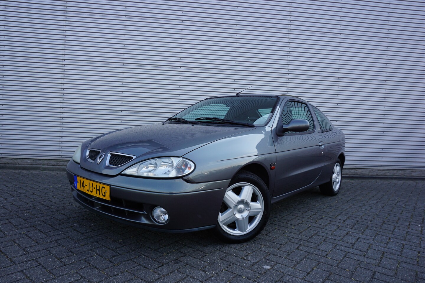 Renault Mégane Coupé - 1.4-16V Sport Way Airco / Elekt. ramen / NAP - AutoWereld.nl