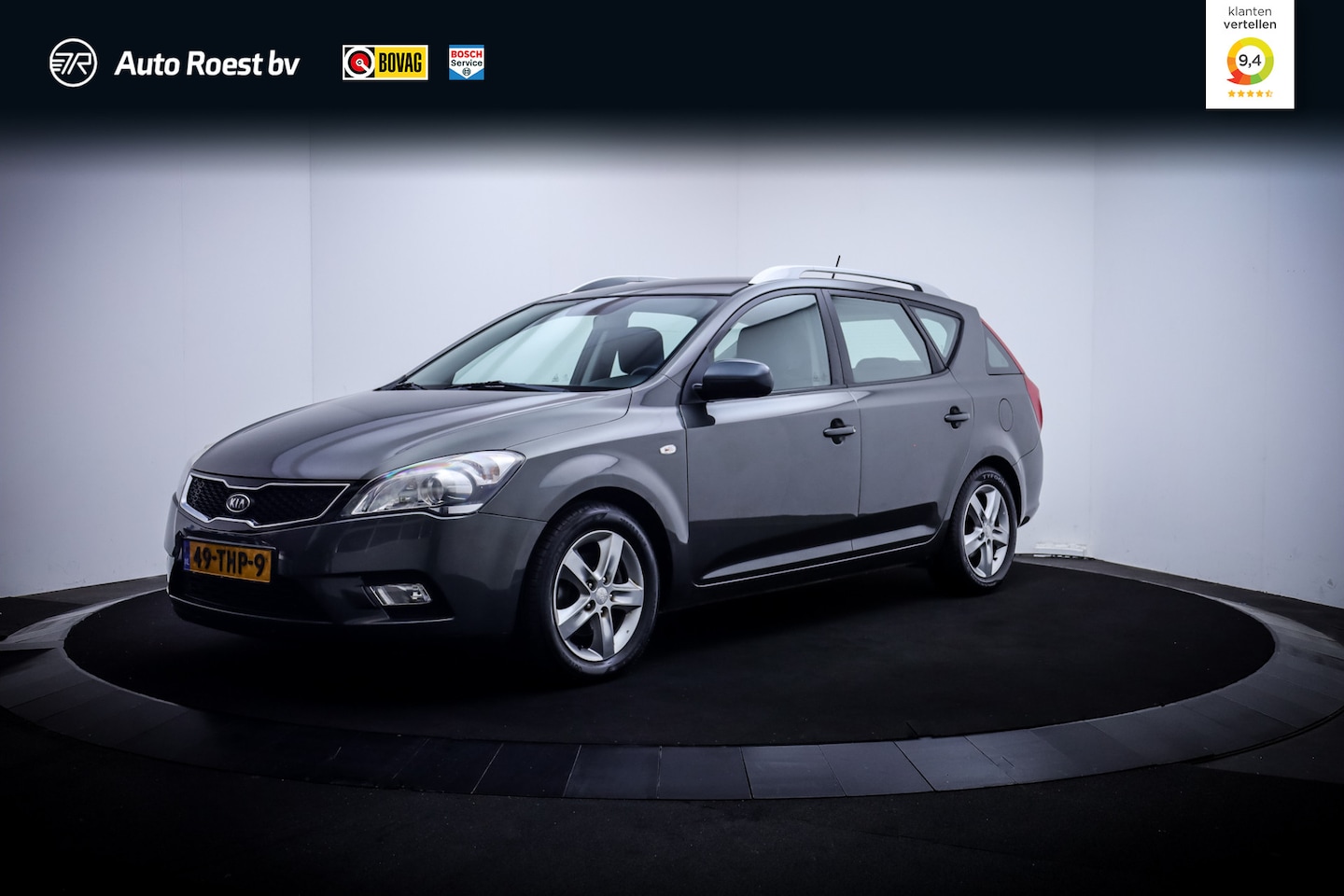 Kia Cee'd Sporty Wagon - 1.4CVVT Navigator Plus Pack CAMERA | AIRCO | NAVI | PDC | LMV | TREKHAAK - AutoWereld.nl