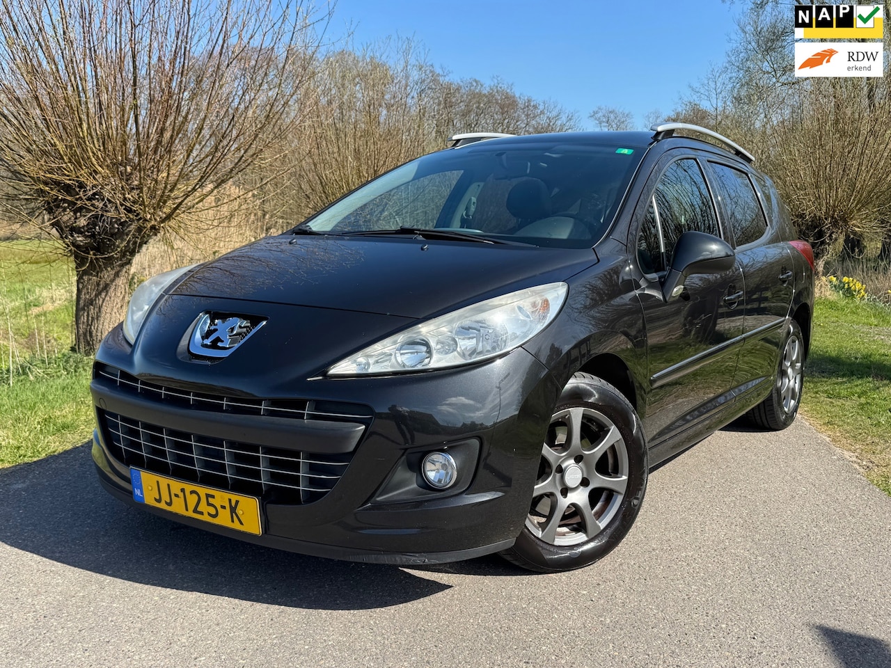 Peugeot 207 SW - 1.4 VTi Blue Lease / Trekhaak / Airco / Radio-CD Speler / LM velgen / Panoramadak - AutoWereld.nl