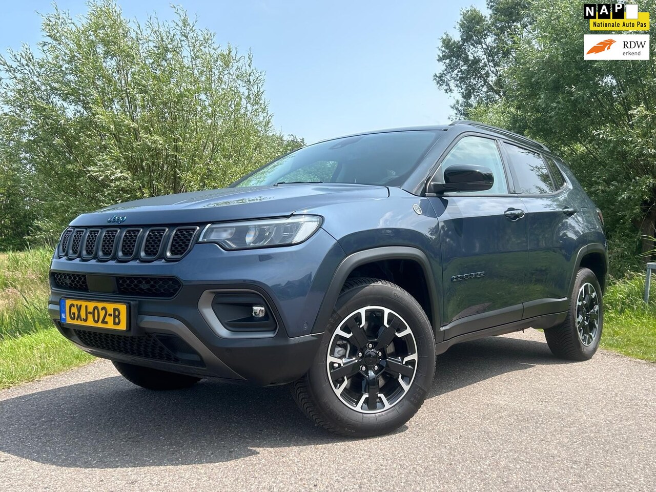 Jeep Compass - 4xe 240 Plug-in Hybrid Electric Trailhawk / BTW Auto / Airco / Navi / Camera / Leder / 2 L - AutoWereld.nl