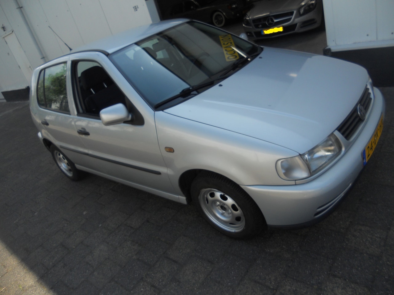 Volkswagen Polo - 1.4 VW Sport 5Bak, Zilver-Metallic, 5 deurs, Cv.   Stereo met Grootbeeldscherm, Bouwjaar 1999' - AutoWereld.nl