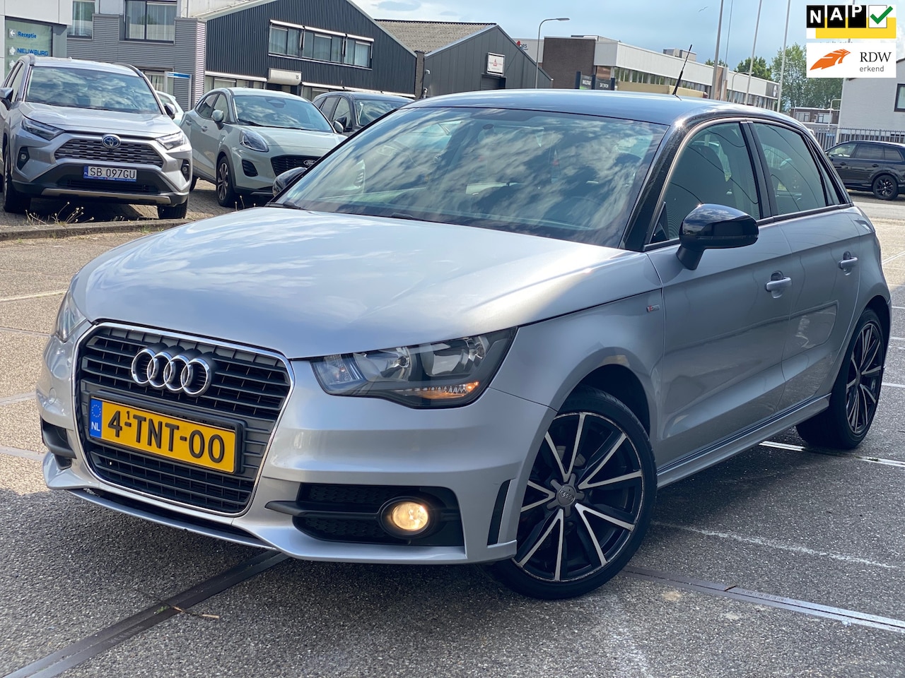 Audi A1 Sportback - 1.2 TFSI Admired/ S LINE/ nap/ dealeronderhouden/ 1jaar apk/ airco/ navi/ pdc/ cruise cont - AutoWereld.nl