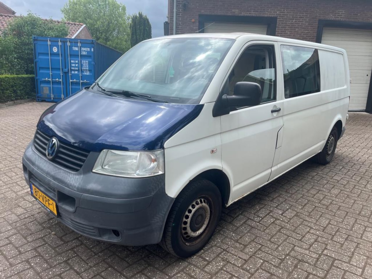 Volkswagen Transporter - 2.5 TDI 340 Trendline DC AIRCO / Lang - AutoWereld.nl