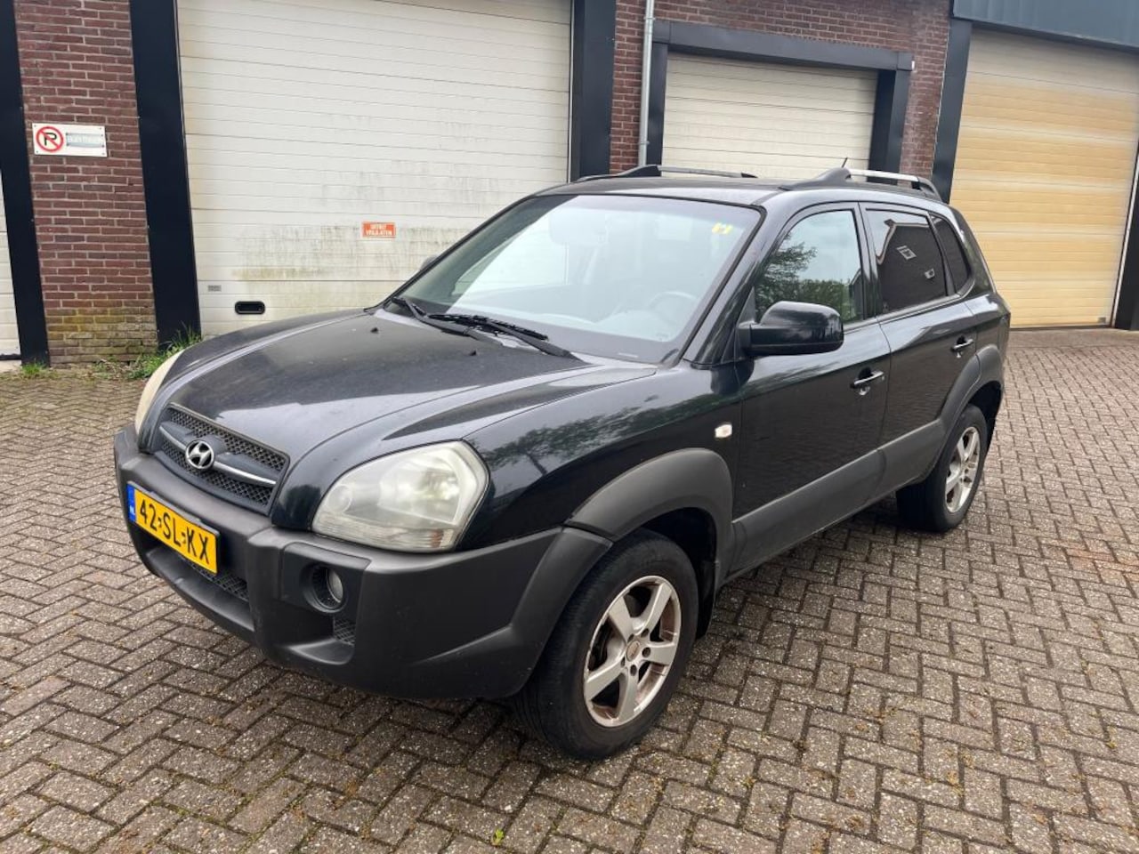 Hyundai Tucson - 2.0i Style CLIMA - AutoWereld.nl