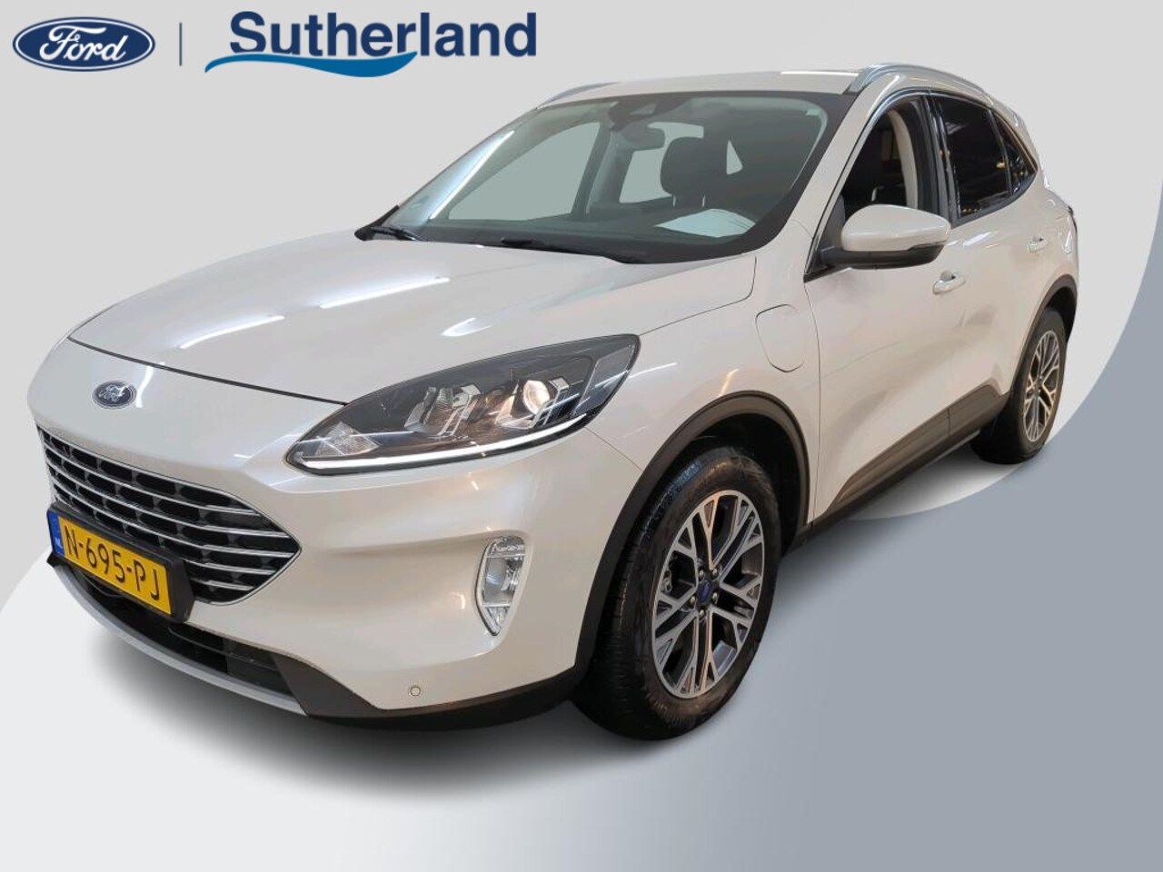 Ford Kuga - 2.5 PHEV Titanium | Navigatie | Privacy glass | Draadloos opladen - AutoWereld.nl