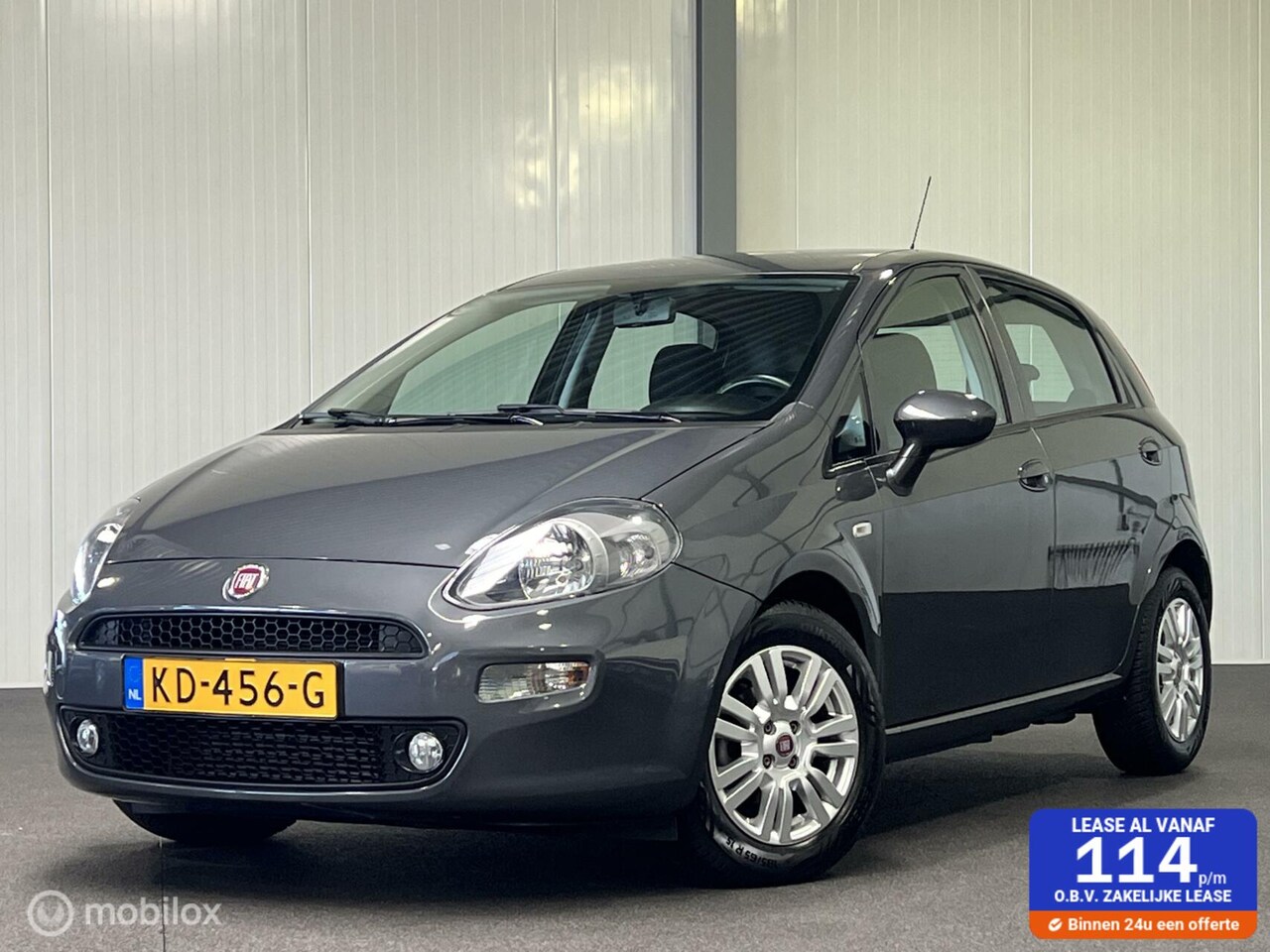 Fiat Punto Evo - 0.9 TwinAir Lounge [ NAP climate cruise LM ] - AutoWereld.nl