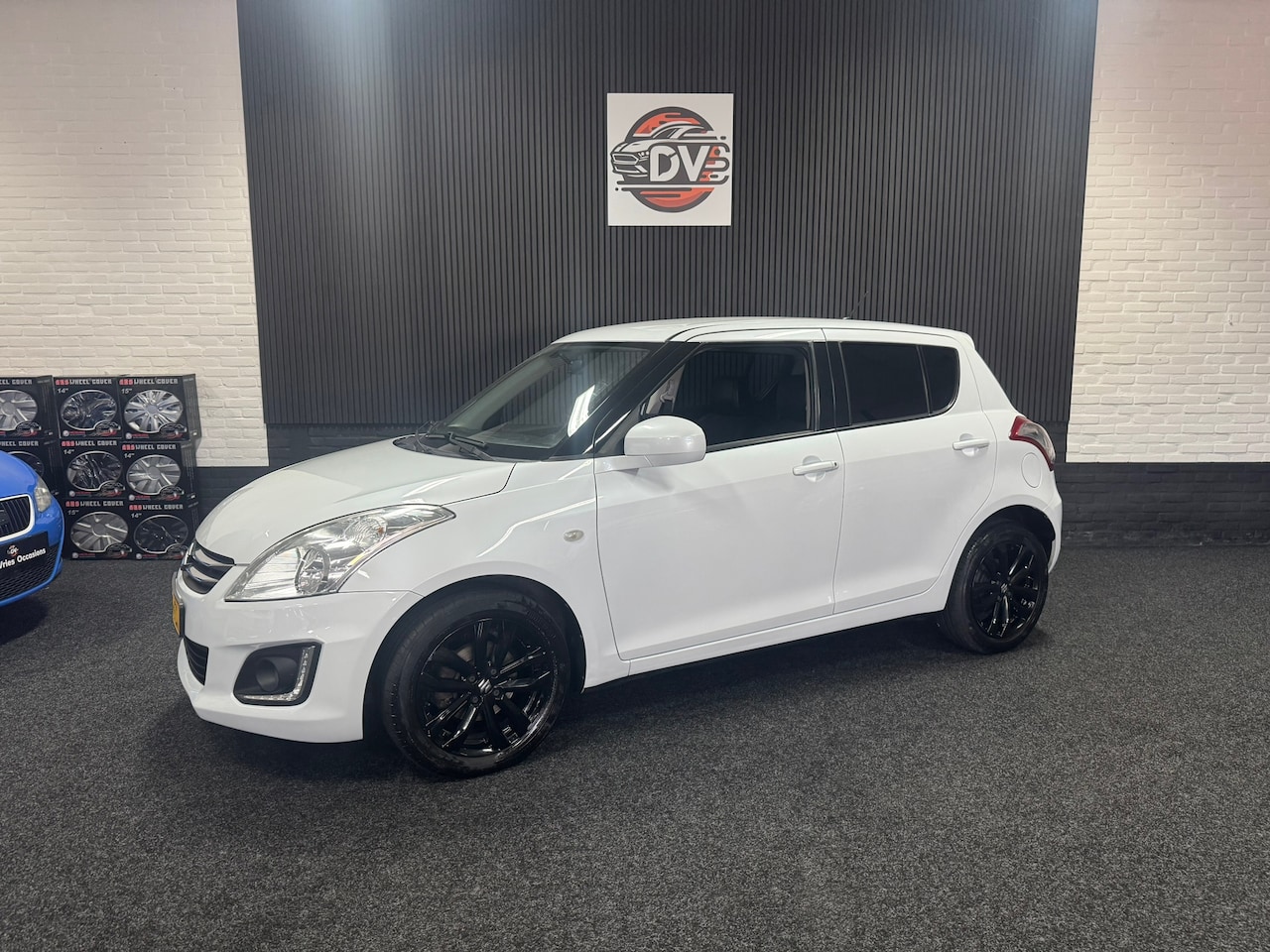 Suzuki Swift - 1.2 Extra, CRUISE, CLIMAT, LMV, HALF LEER, STL VERW, PARELMOER - AutoWereld.nl